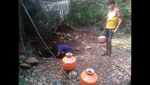 As wells turn dry, Gaondongrim locals dig holes in river, stream beds for water