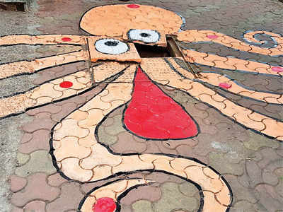 Kandivali residents are using art to draw BMC’s attention to open manholes
