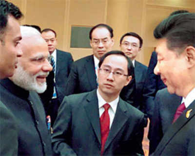 PM Narendra Modi, Xi Jinping shake hands, chat at BRICS meeting