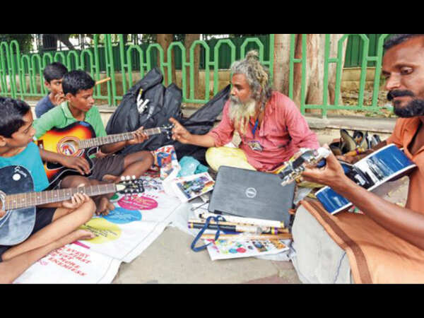 Delhi: Engineer turns guitar teacher for Re 1 per day
