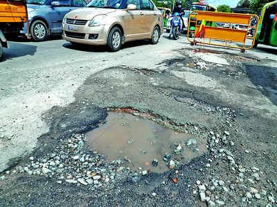 Bengaluru sinking in potholes