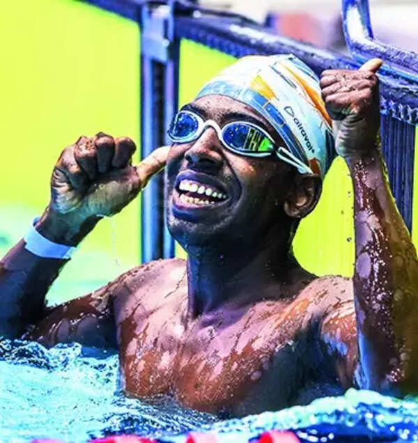 Swimming against the tide, Dinesh corners glory