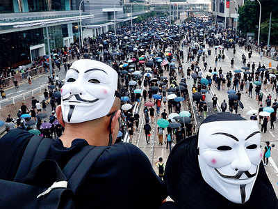 Hong Kong banning face masks to tackle disguised protesters