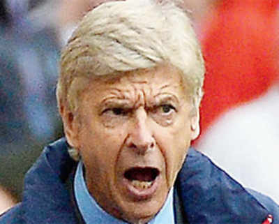 Wenger defends transfer policy