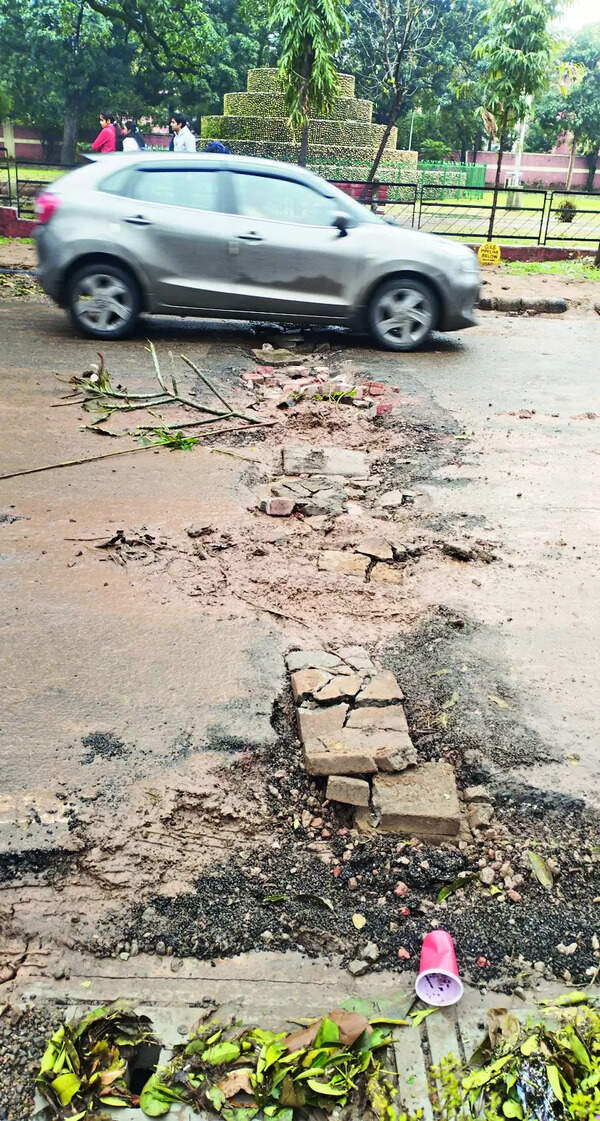 Recently repaired road caves in after hailstorm