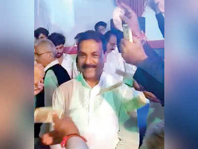 BJP lashes out at Congress MLA Naseem Khan’s cash shower at Ghatkopar Ganpati pandal