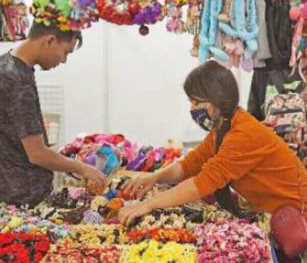 Shrunk to a fourth in size, trade fair tries to make space for all
