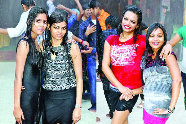 Youngsters enjoy at a rain dance party at a club in Patna