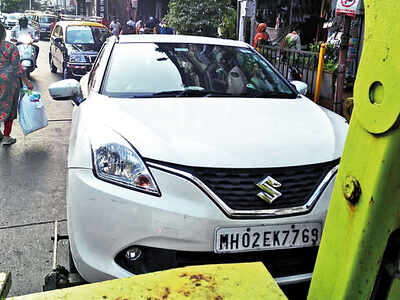 After 6-month gap, cops start to tow cars again