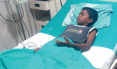 Boy, 11, fights off python five times his height