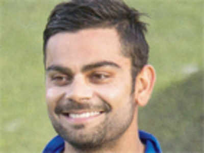Injured Dhoni out of Asia Cup; Virat to lead