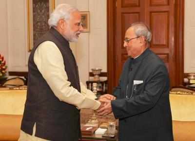 Prime Minister Narendra Modi greets President Pranab Mukherjee on birthday