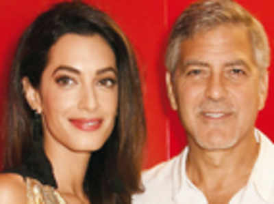 George and Amal Clooney celebrate 1st anniversary