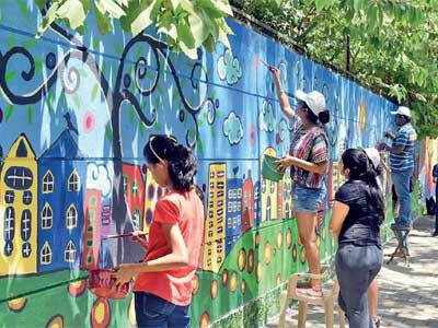 Wall done! Community unites to paint township