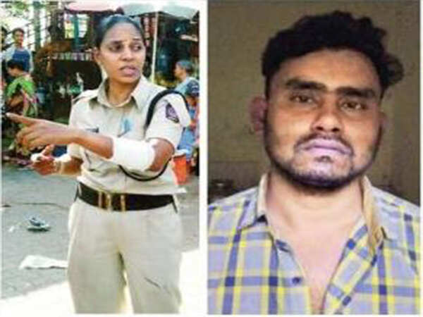 Auto driver beats up woman cop, pushes her into a drain