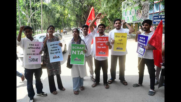 AISA takes out protest march, demands probe into exam paper leaks, police action