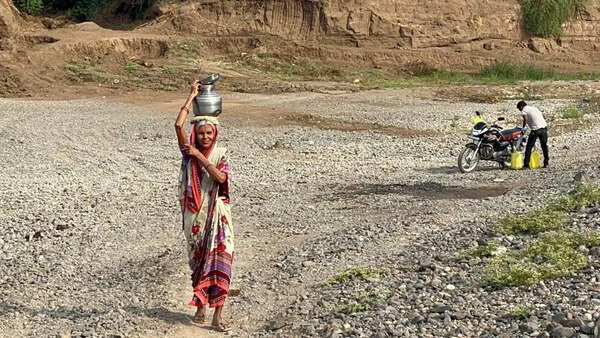 Scorching apathy at 47°C: Kavatha digs for drops in cracked riverbed