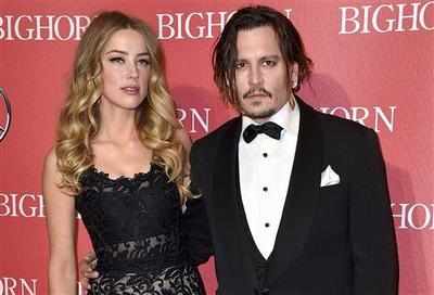 Depp loses cool in fight with Amber Heard