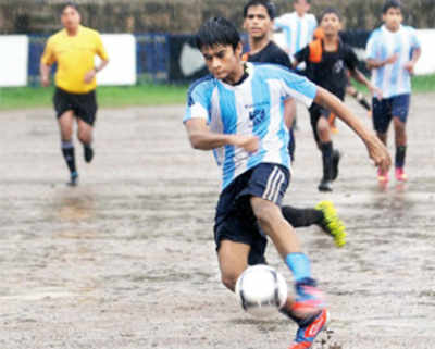 Football shines on a damp and rainy day