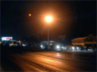 Streetlights switched on, working on elevated tollway