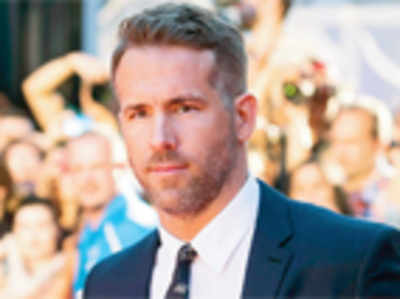 Ryan Reynolds’ pal sells his baby pictures