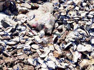 1 lakh masks dumped in Bhiwandi; team of officials inspect the spot near water pipeline