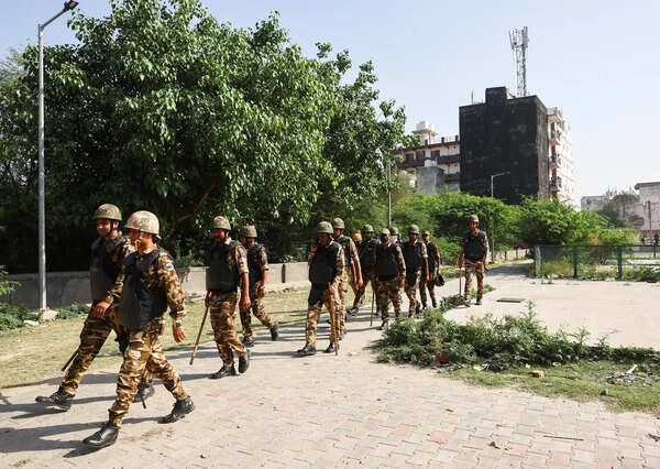 Factories reopen in Noida’s industry hub under heavy police watch