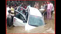 Mandsaur: Car falls off bridge into flooded nullah, 2 rescued 