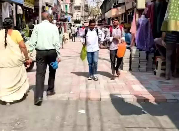 Mangal Bazaar shopkeepers oppose paver block replacement