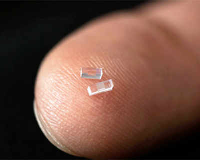 Atom smasher on a tiny glass chip