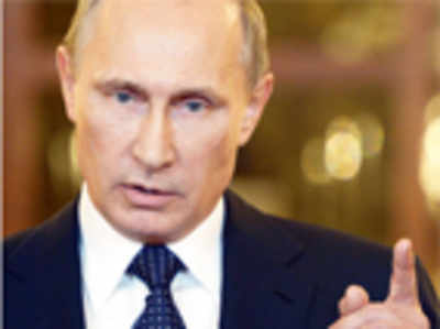 Putin hits back on sanctions, bans food from West