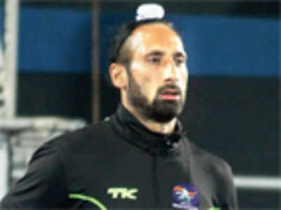 By default, Sardar Singh gets to be the flag-bearer
