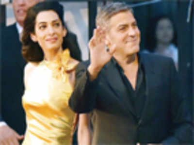 George, Amal Clooney celebrate first anniversary
