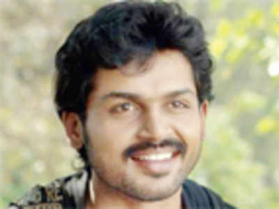 Karthi goes back to ‘lucky’ director