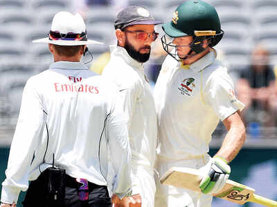 Virat Kohli, Tim Paine clash verbally; umpire intervenes