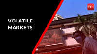 Sensex, Nifty end on flat note in choppy trade 