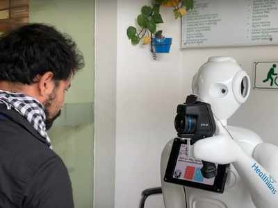 Firm develops robots to screen people for potential Covid-19 risks