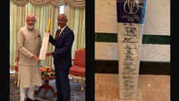 PM Narendra Modi presents Maldives President a cricket bat 