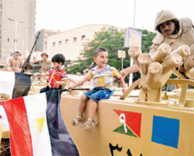 Army moves in tanks, Morsi out as prez
