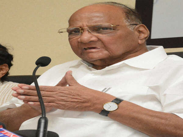 Hold talks, halt land measurement: Sharad Pawar