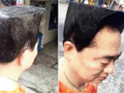 Man gets bizarre haircut to woo young woman