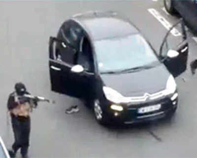12 shot dead at french satirical newspaper