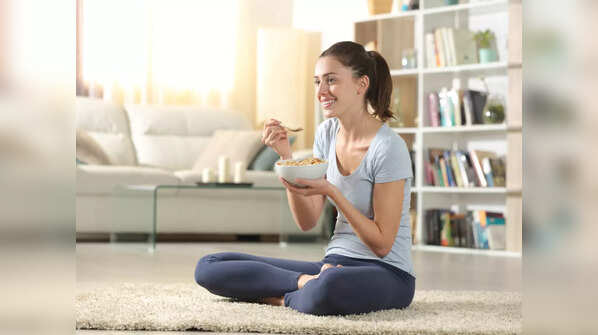 Sit cross-legged on floor