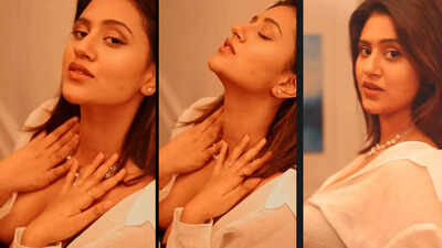 Anjali Arora's latest video in unbuttoned white shirt and black ...