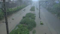 Mumbaikars wake up to flooded streets, submerged railway tracks following heavy showers 
