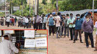 Visakhapatnam: People wait in long queues to buy liquor 