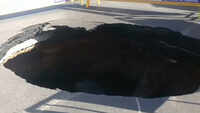 Road caved in at Madhya Kailash junction in Chennai 
