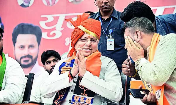 Dhami praises Gupta, bats for double engine govt in Hry
