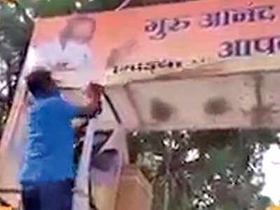 Louts tear down Hindi hoarding