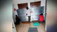 Bengaluru: Civic officials seal apartment door with metal sheets after domestic help tested positive 